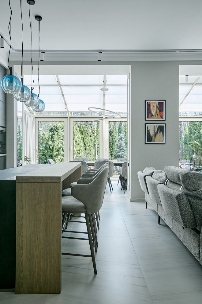 Houzz тур: Трехэтажный таунхаус с зимним садом для молодой семьи
