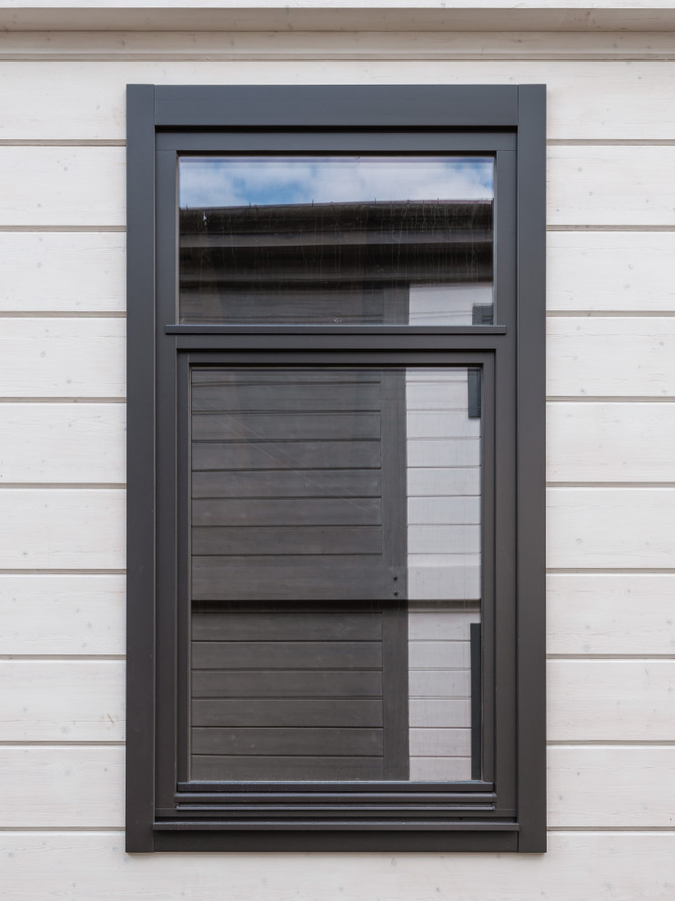 Трапецевидные окна, порталы и входные двери для современного дома