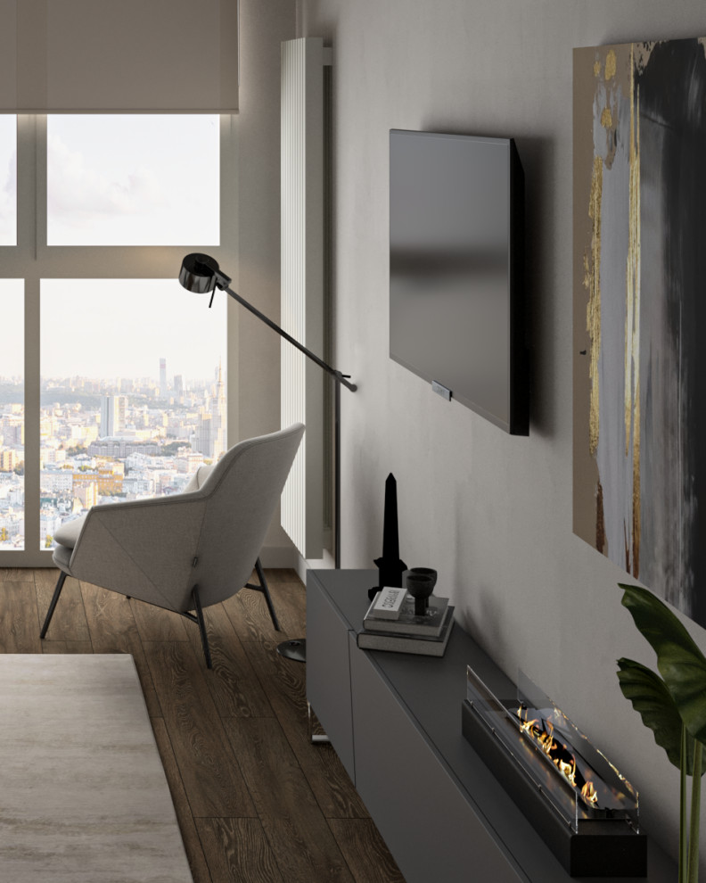 Зона гостиной с ТВ, камином и зоной отдыха у панорамного окна