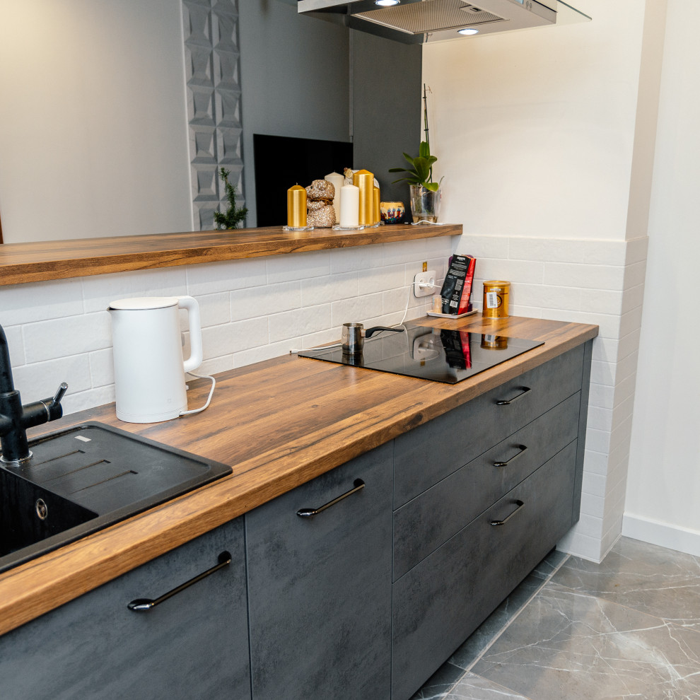 Кухня под бетон с оригинальной барной стойкой