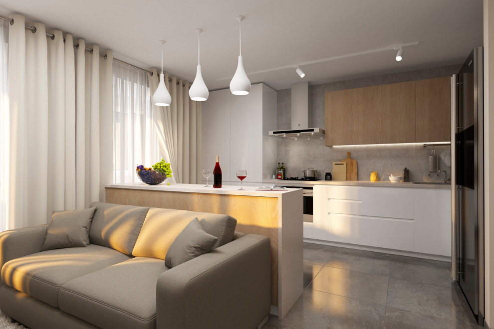 Объединенные в единое пространство кухня, столовая, гостиная.