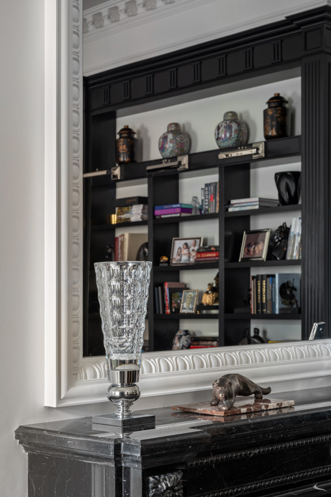 Телевизор над камином