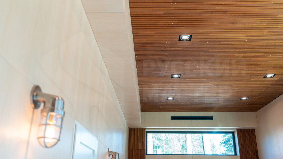 Гостевой дом: фасад из скандинавской доски, рейки из тика и шпонированные панели