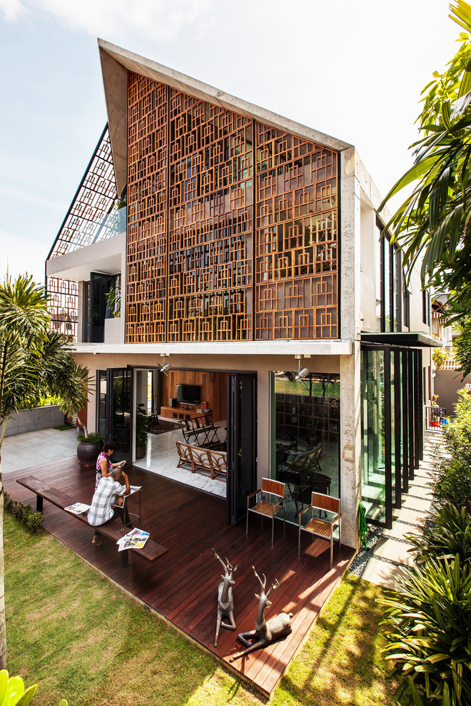 Houzz Сингапур: Бунгало с резным фасадом - ширмой