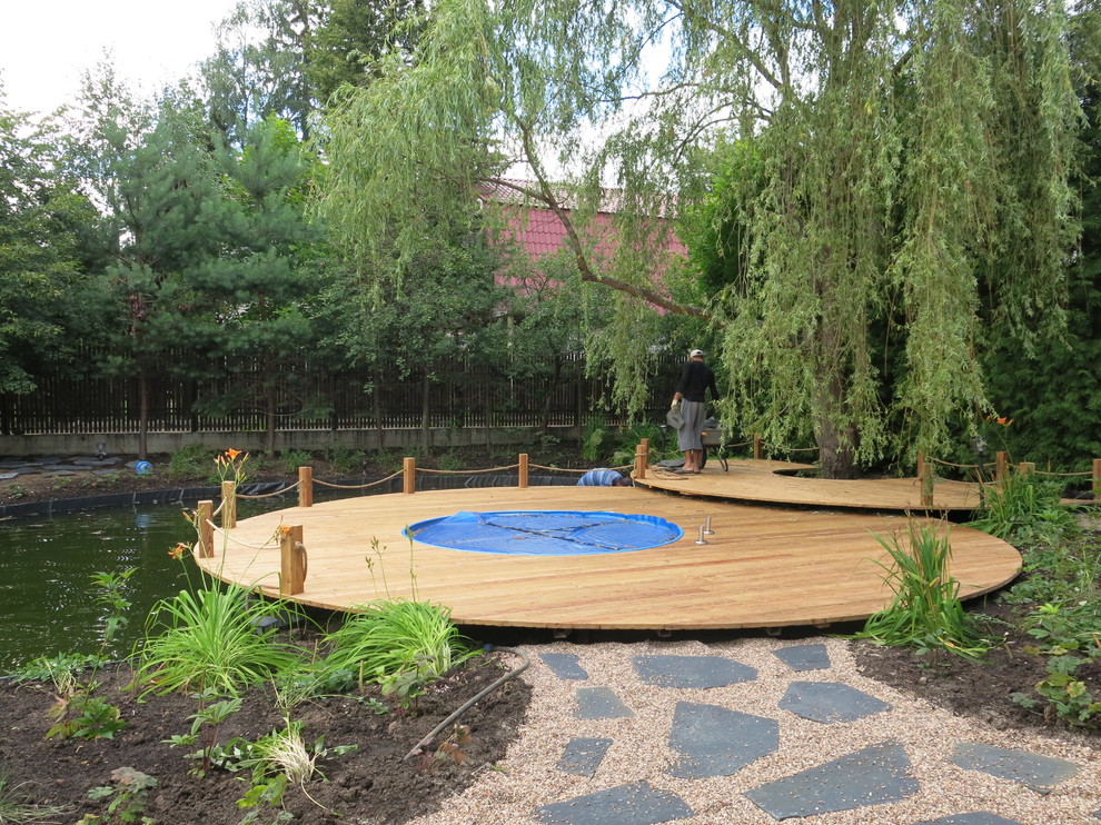 Выход на паркет: Садовый настил как доступная альтернатива террасам