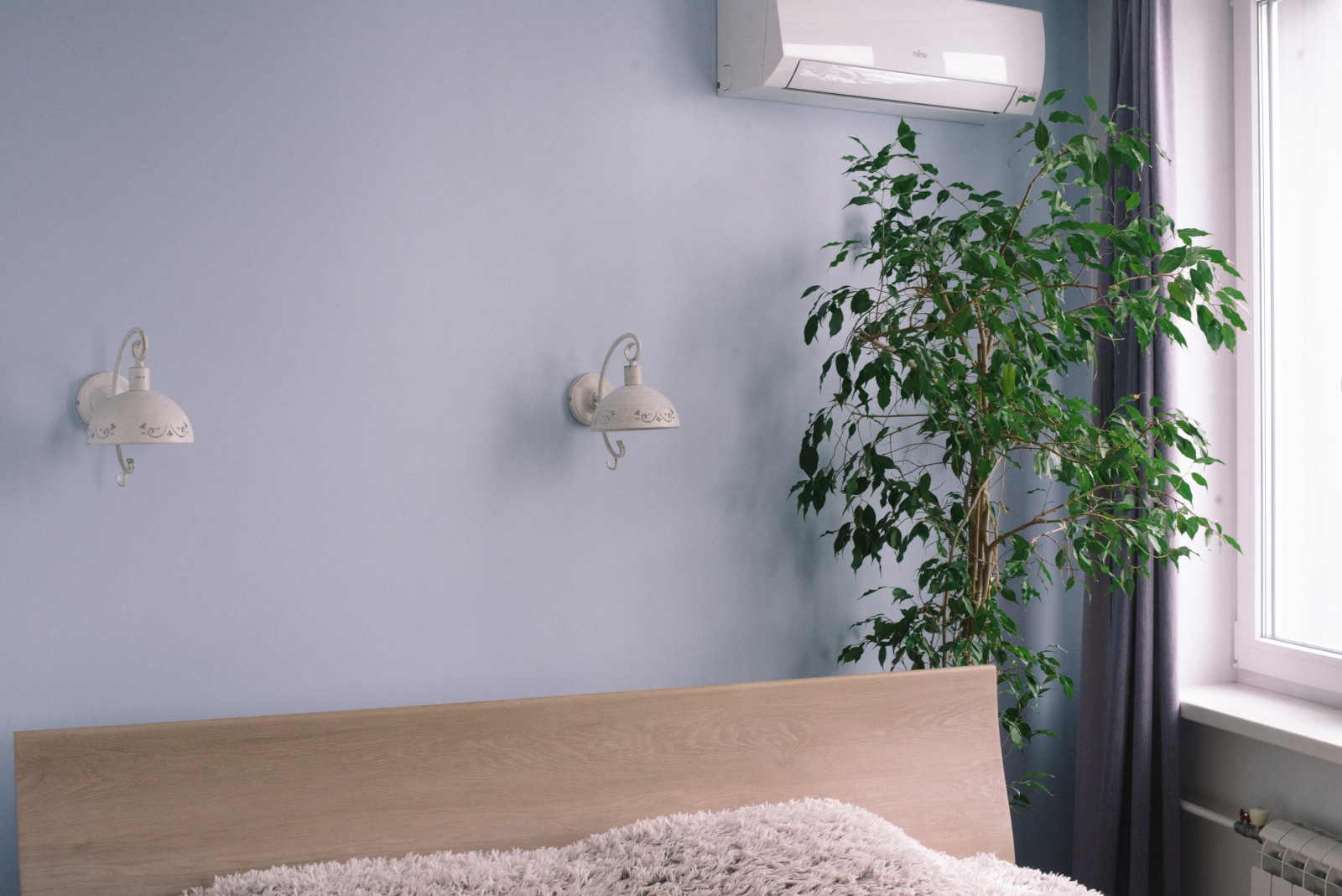 Перепланировка квартиры с радиальной фасадной стеной, авторская мозаика.