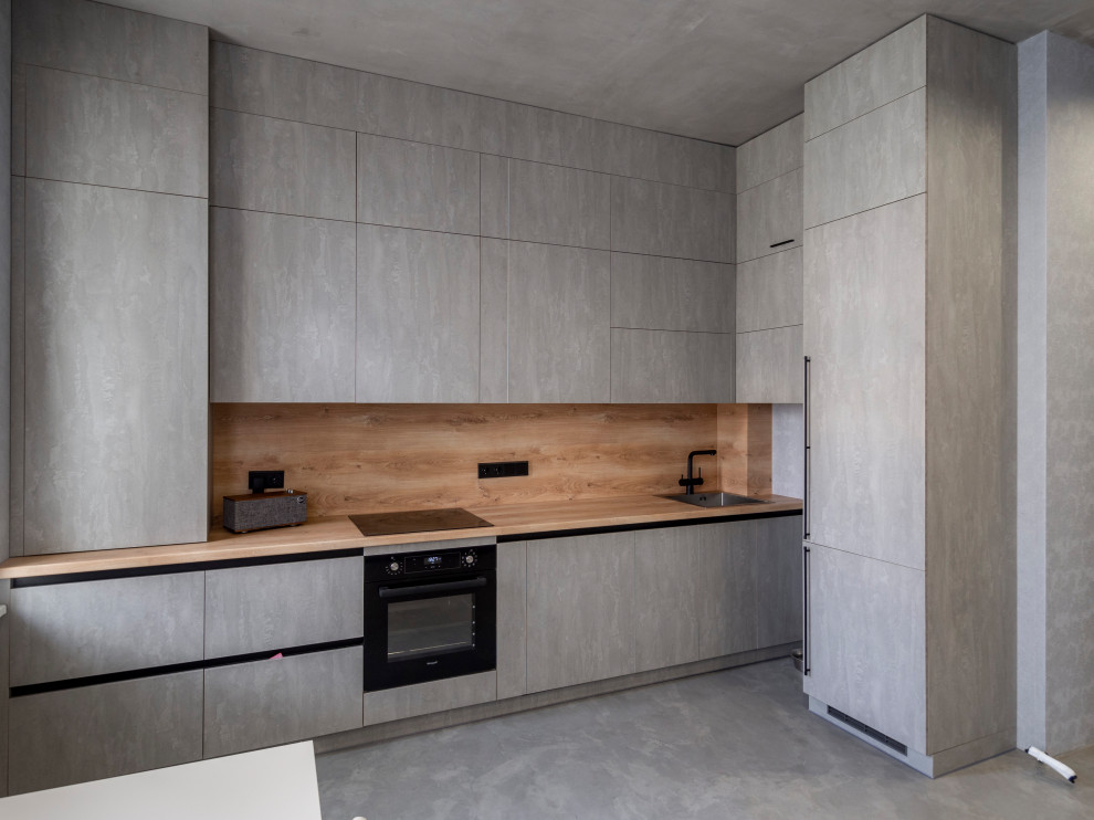 Элегантная минималистичная кухня в сером цвете