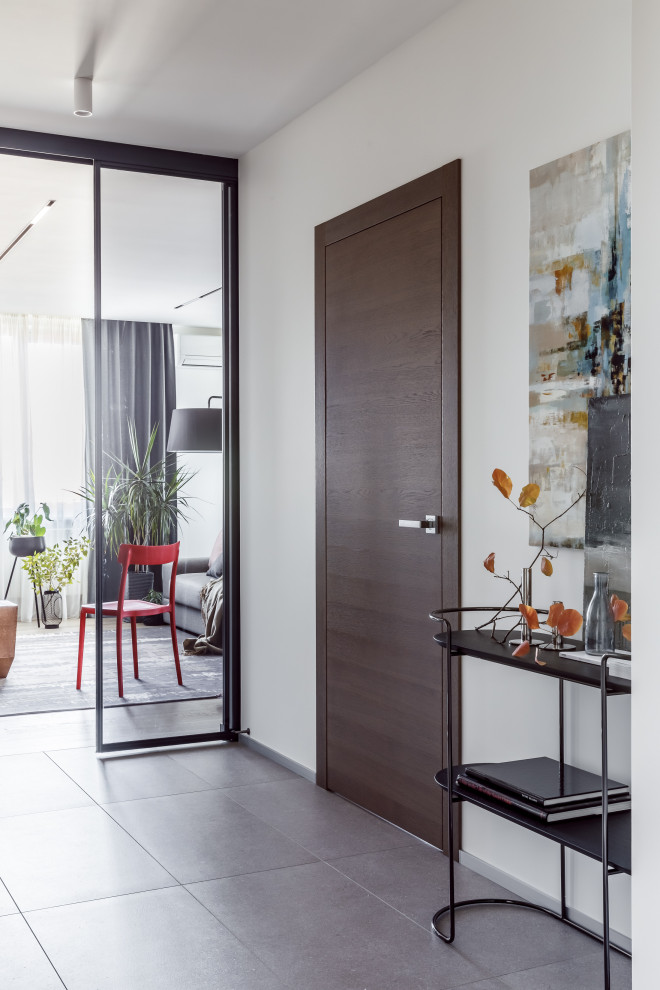 Houzz тур: Квартира для пары — любителей серого цвета и дерева