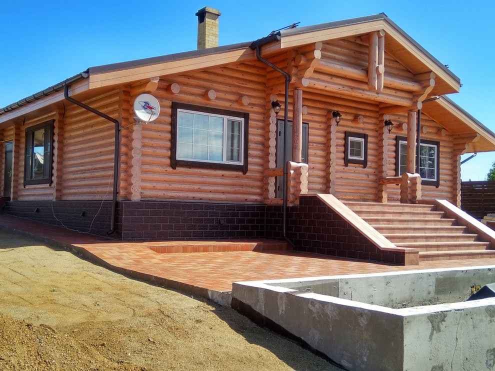 Обложка проекта: плитка stroeher на фасаде деревянного дома