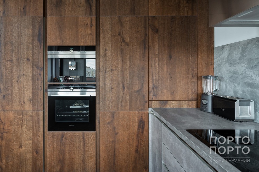 Кухня в современном стиле под бетон со шпоном