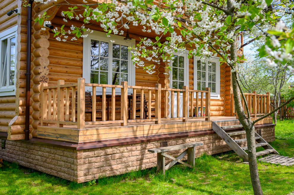 отделка дома из оцилиндрованного бревна