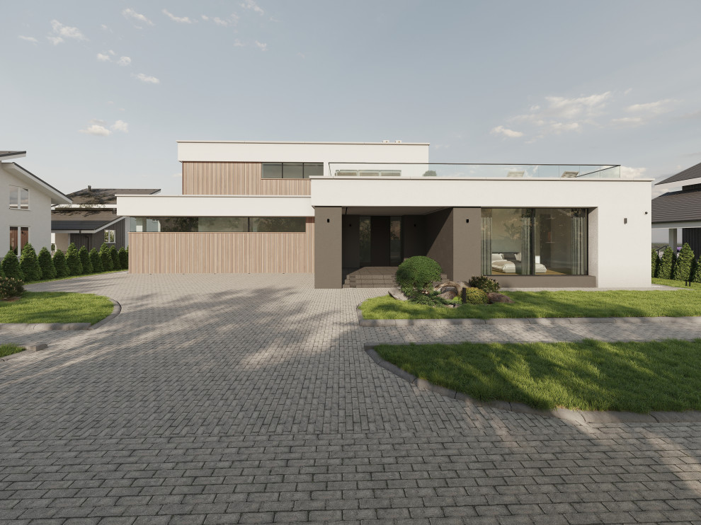 Двухэтажный дом с плоской кровлей