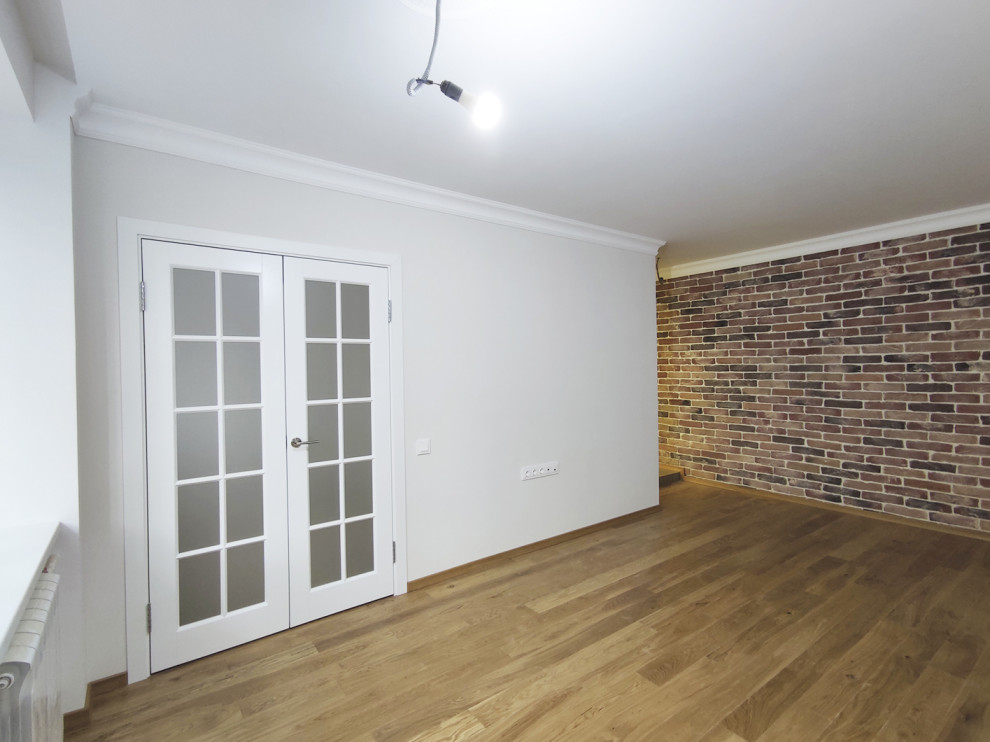 Гостиная с кирпичной стеной