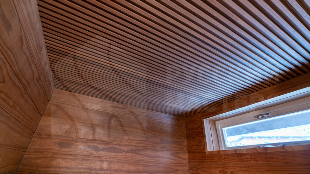 Сауна с изогнутыми полками из новозеландской сосны Pino Premio