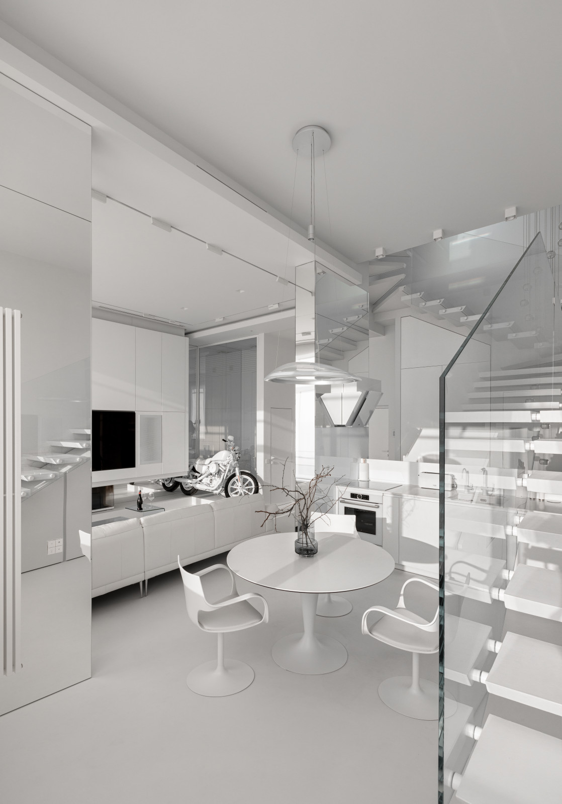 Stylish monochromatic white penthouse