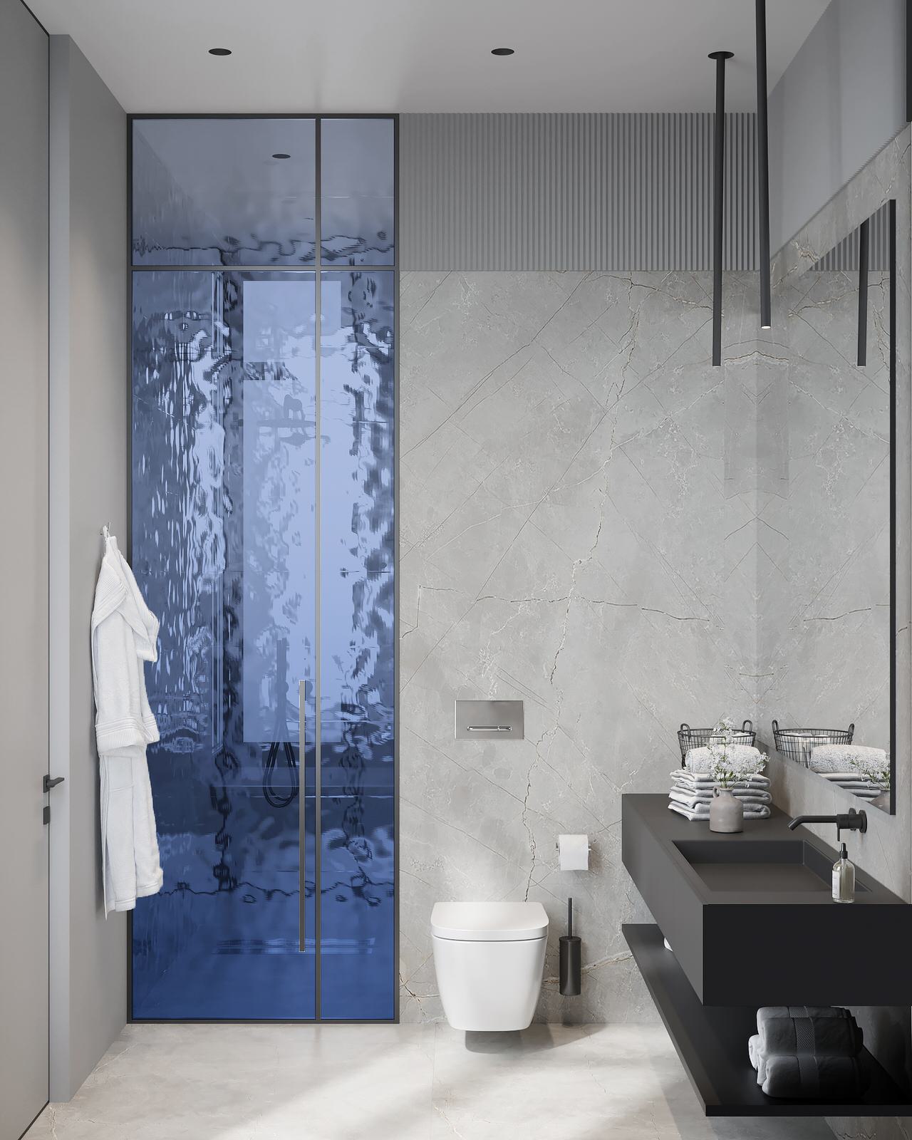 Монохромный интерьер ванной комнаты с необычной душевой