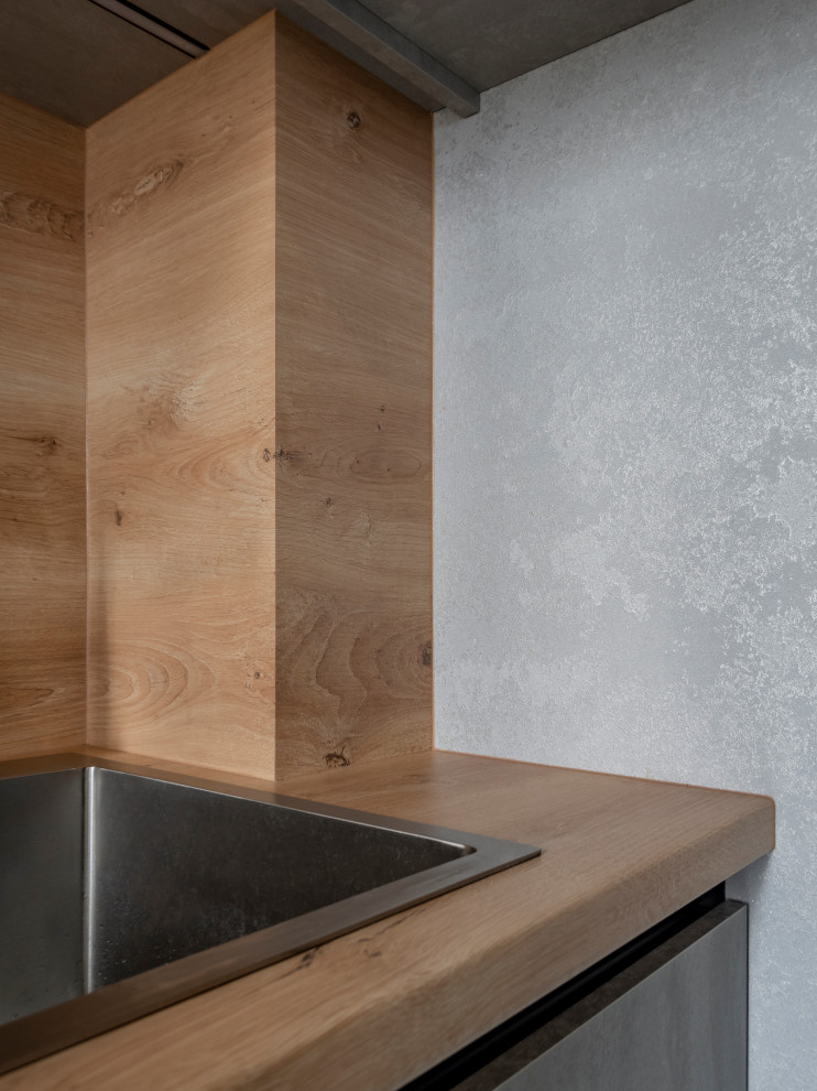 Элегантная минималистичная кухня в сером цвете