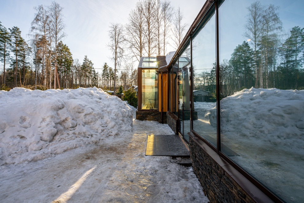 Строительство загородного дома с зимним садом с электрохромными стеклами перемен