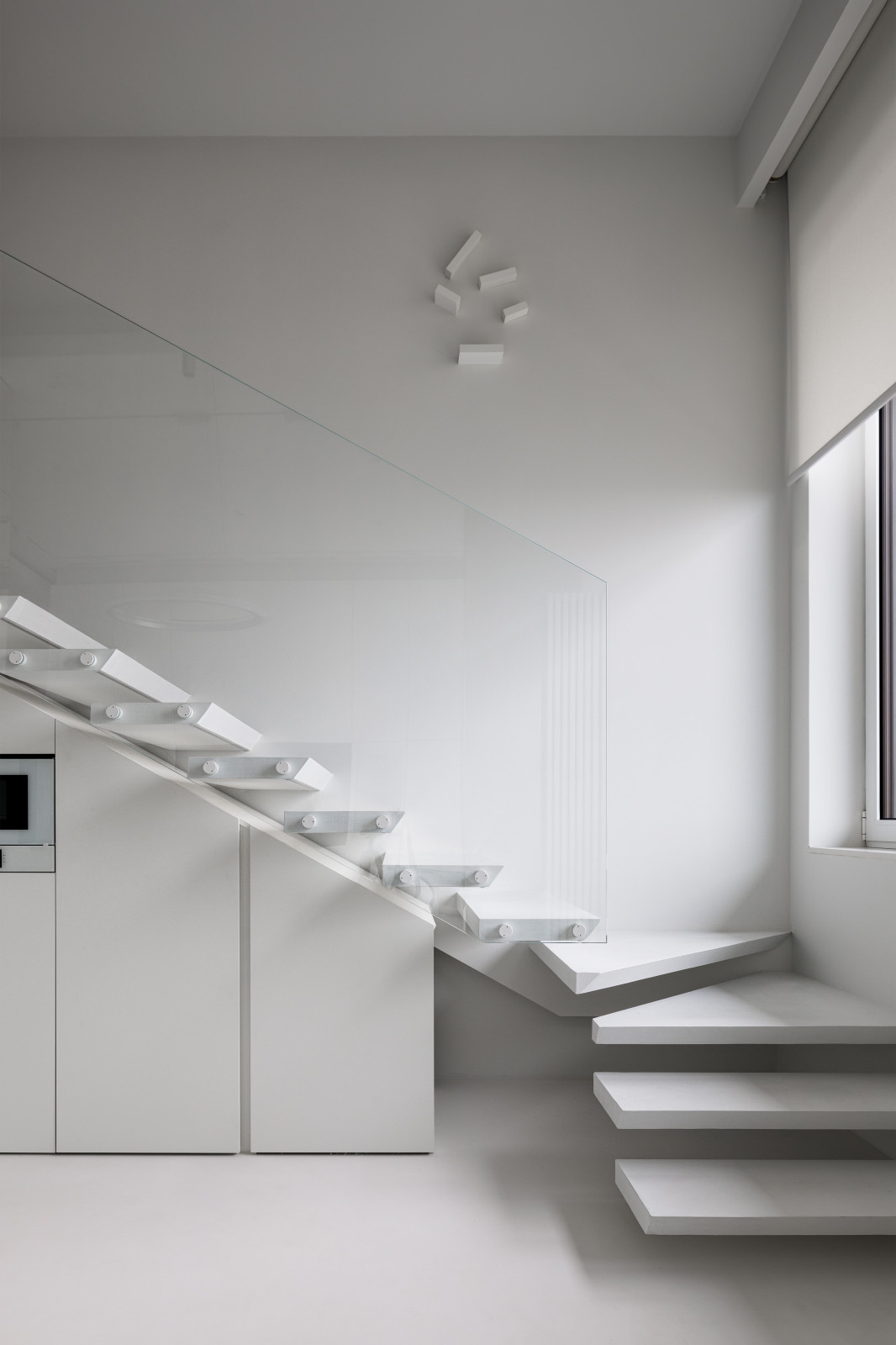 Stylish monochromatic white penthouse