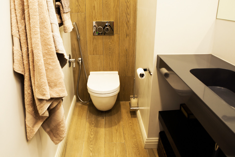 Houzz тур: Кирпич и дерево в квартире для молодой семьи