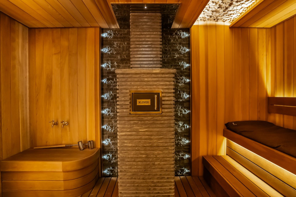 Обложка проекта: Банная печь Klover-35 в облицовке из талькомагнезита в обработке Радиатор