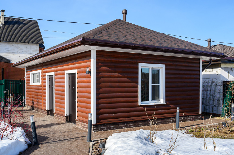 отделка дома из оцилиндрованного бревна