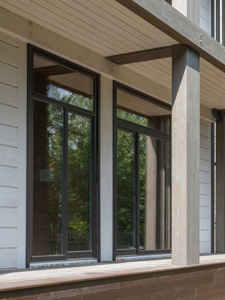 Трапецевидные окна, порталы и входные двери для современного дома