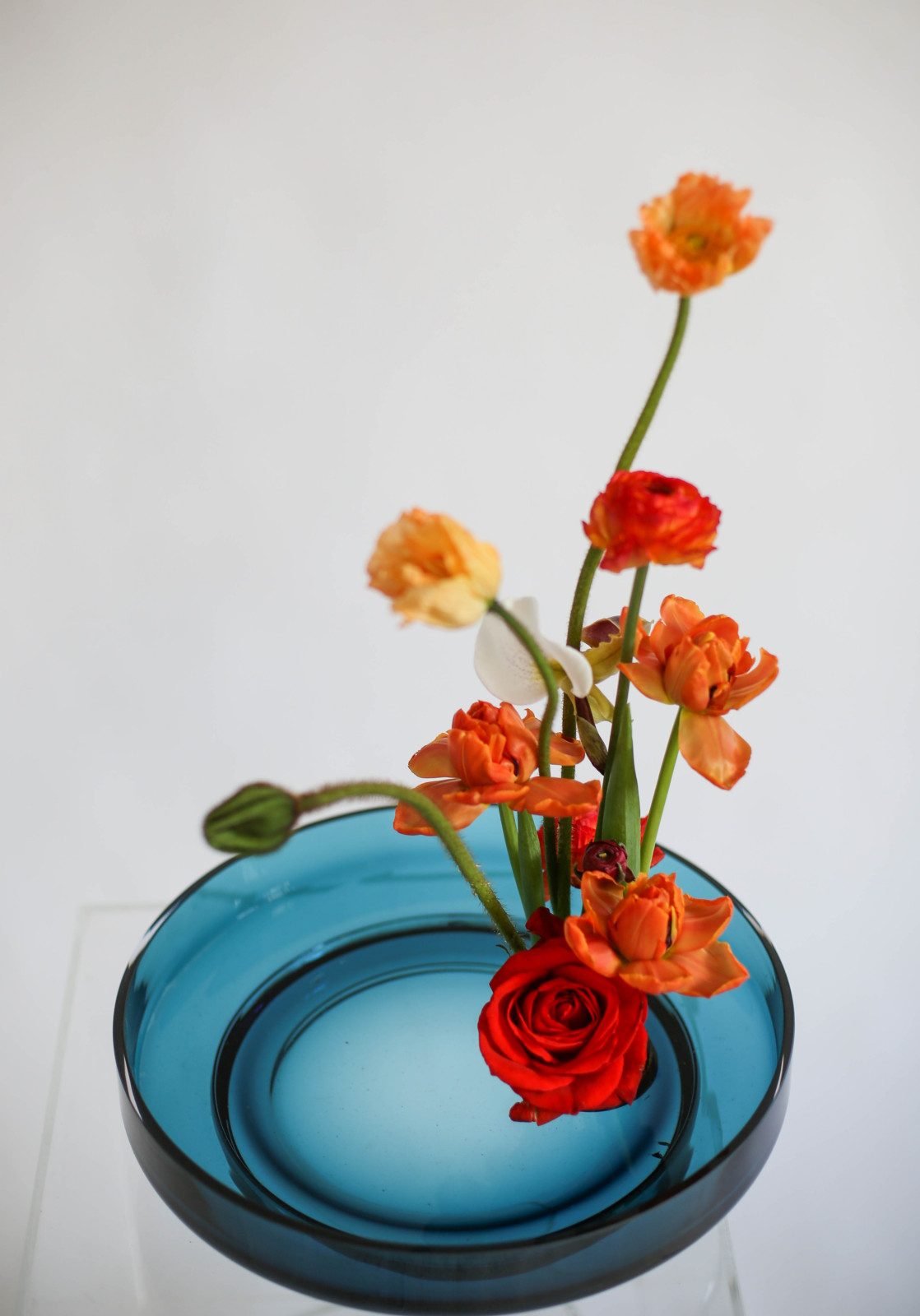 Flower arrangements in an&angel glass