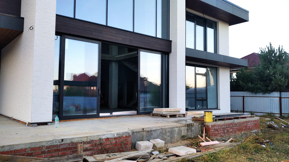 Отделка свесов дома лиственницей