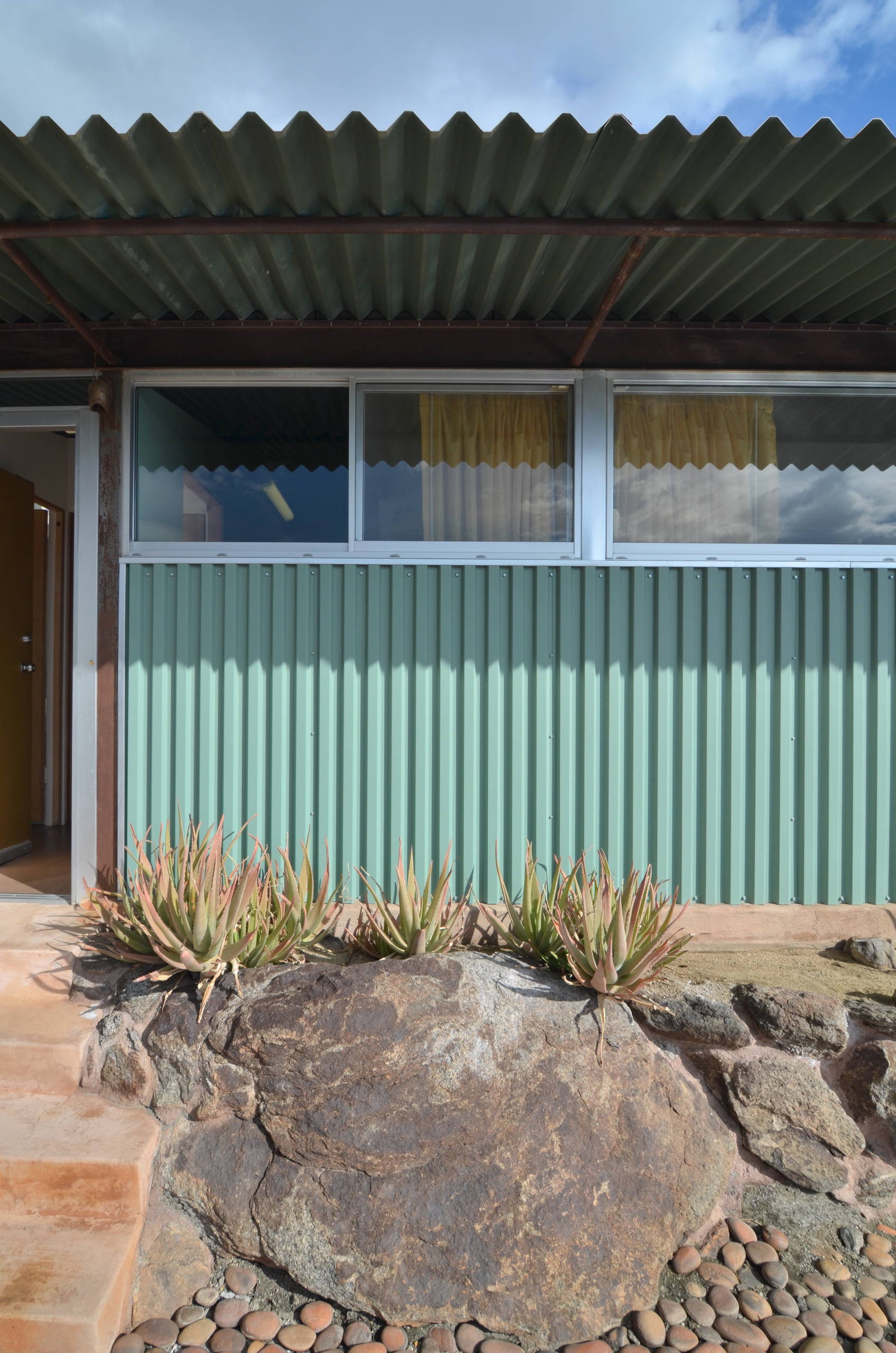 Архитектура: Дом-легенда с валуном внутри