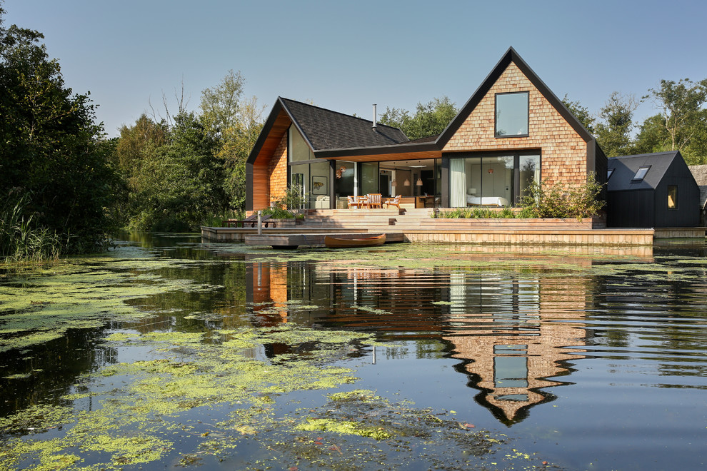 Houzz Британия: Дом на озере с собственной лагуной