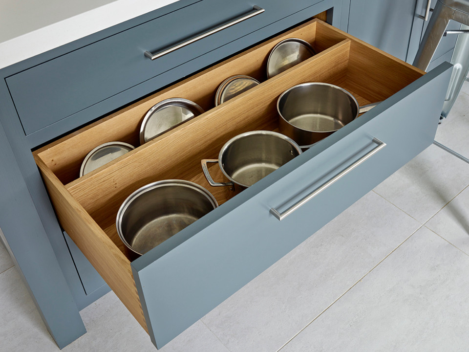 Порядок: 12 идей, где хранить крышки от кастрюль