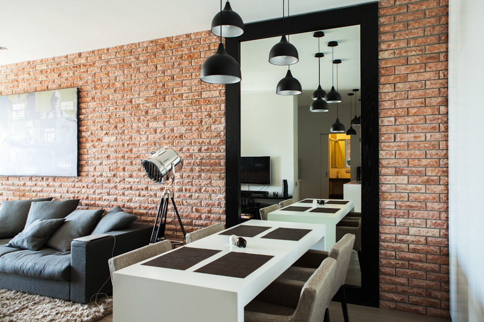 Houzz тур: Кирпич и дерево в квартире для молодой семьи
